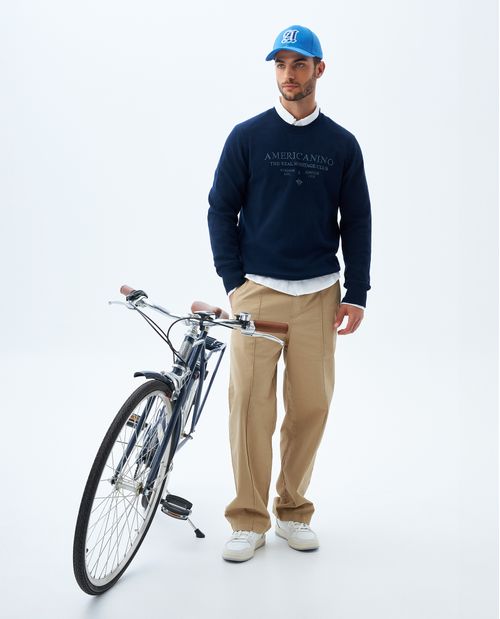 Buzo tejido con detalles bordados para hombre