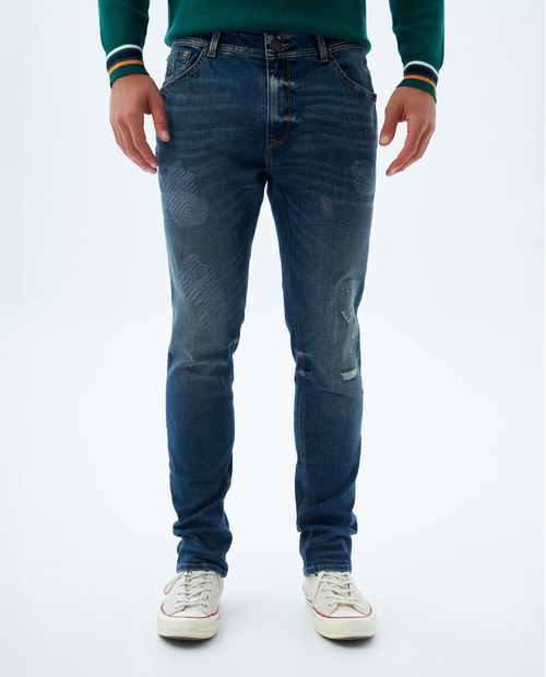 Jean Tapered tono medio con rotos para hombre