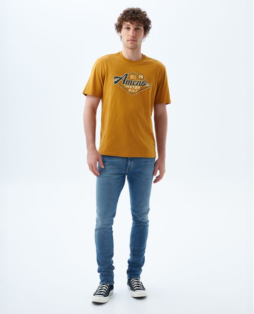 Jean Tapered tono medio con tallones para hombre