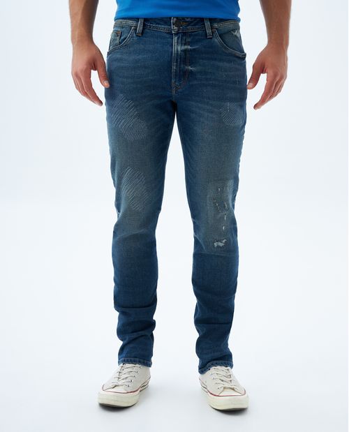 Jean slim con rotos para hombre
