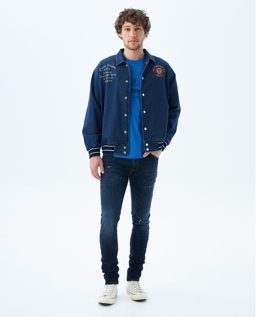 Jean Skinny tono oscuro con raspones para hombre