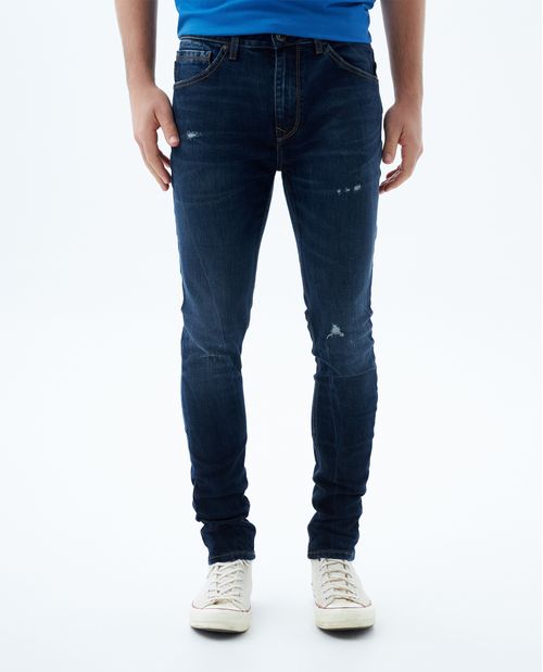 Jean Skinny tono oscuro con raspones para hombre