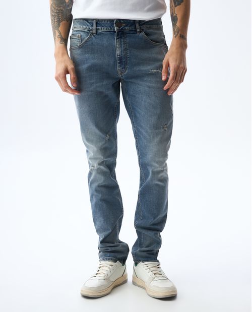Jean Slim tono oscuro con rotos para hombre