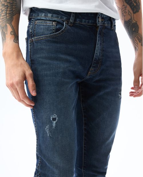 Jean Tapered con rotos para hombre