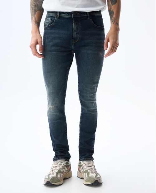 Jean Skinny tono oscuro con tallones para hombre