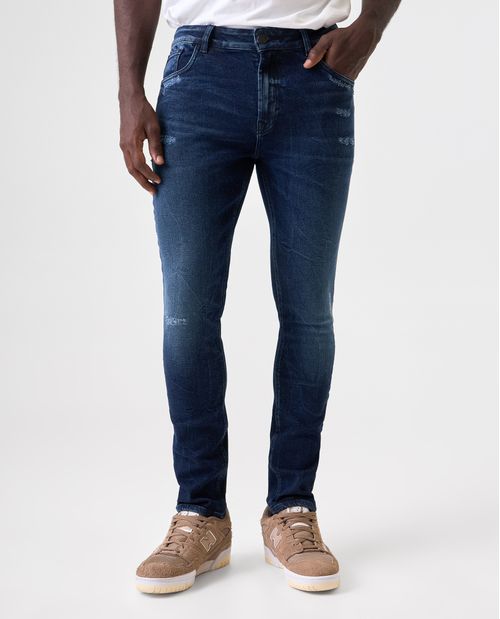 Jean Skinny oscuro con raspones para hombre