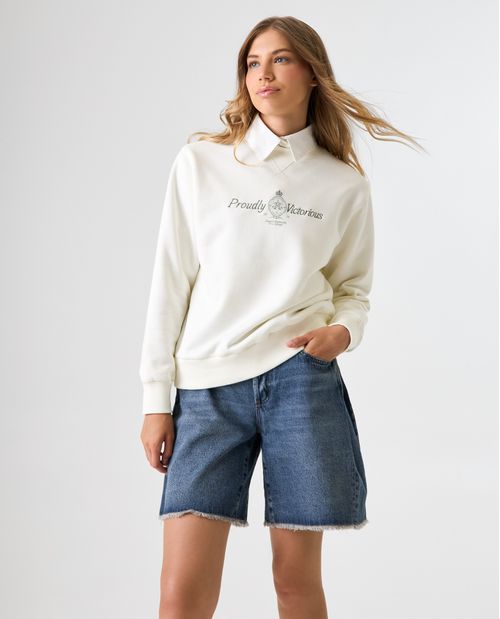Buzo cerrado con detalles bordados para mujer