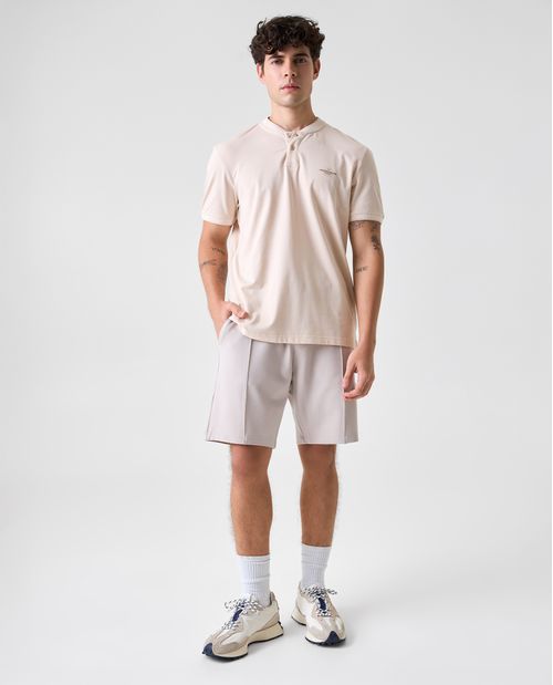 Polo cuello neru con bordado en punto corazón para hombre